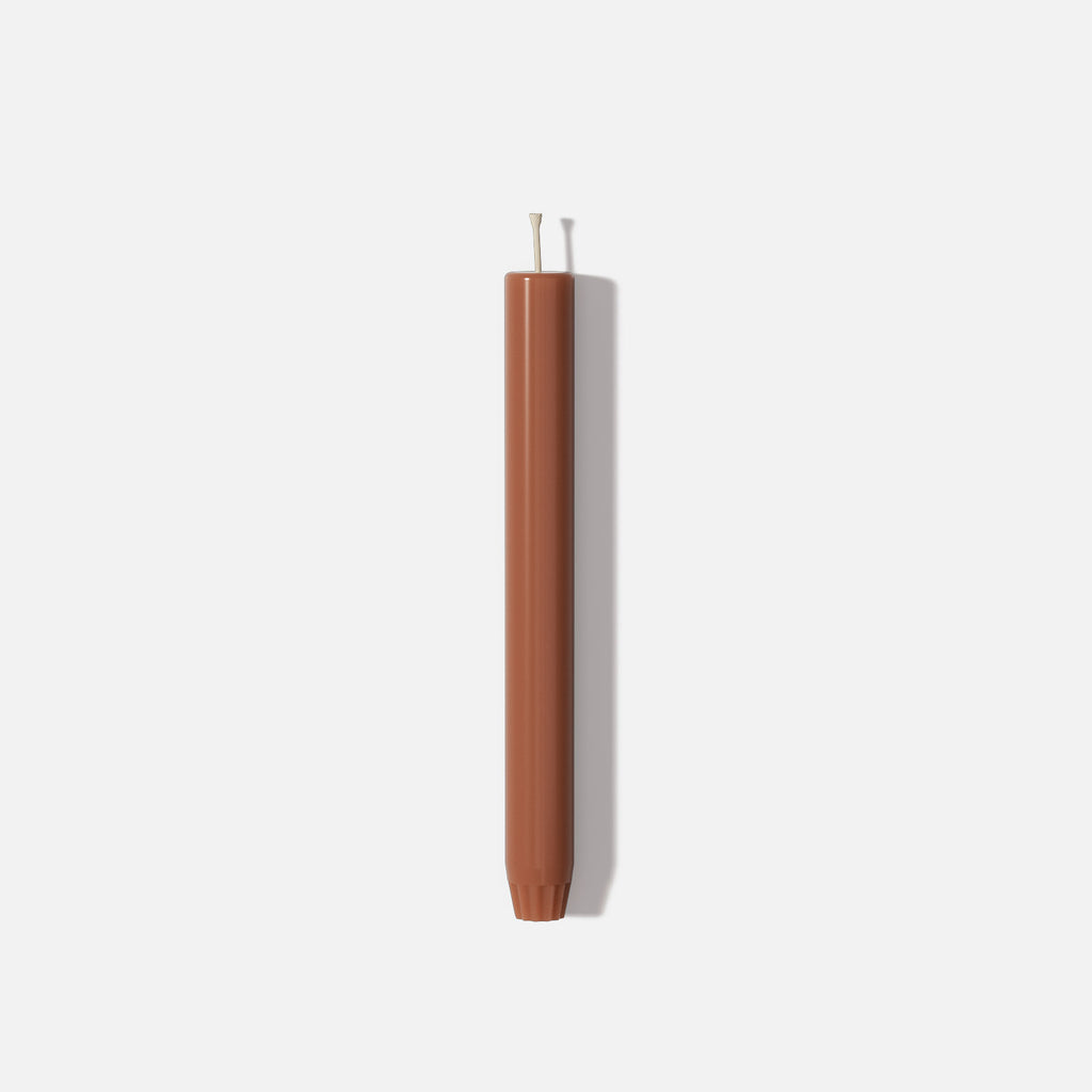 9.3" classic taper candle in terracotta brown with straight sides, rounded tip, and fluted base - Boowan Nicole