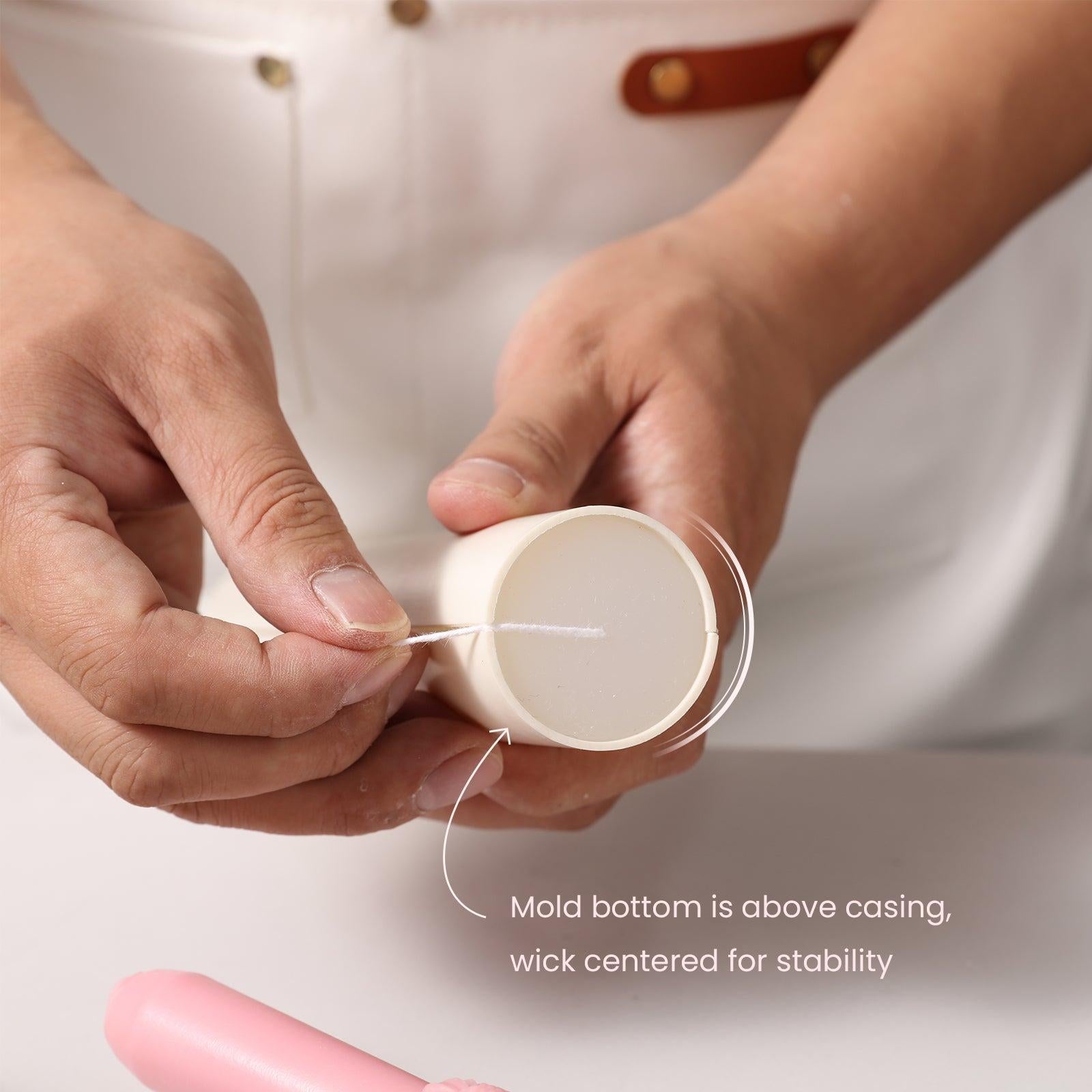 The candle mold has uniquely designed positioning holes for easy insertion of candle wicks, designed by Boowan Nicole.