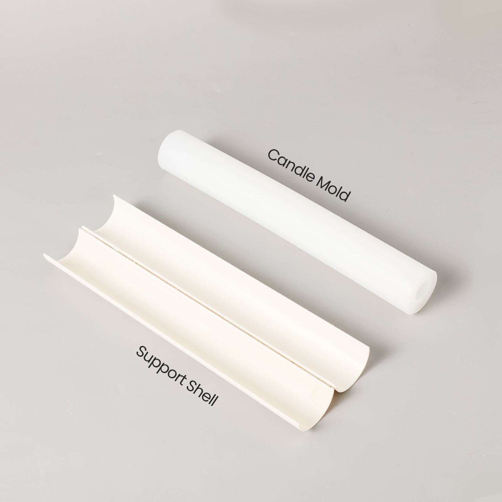 Explore the essentials of the candle-making process—plastic support casing and the Love Heart Taper Candle Silicone Mold.