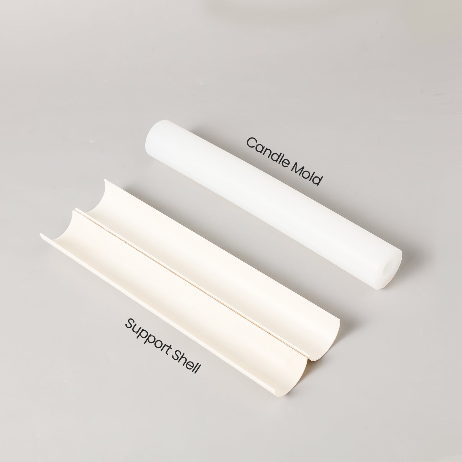 The silicone mold set consists of a silicone mold for making tapered candles and an outer supporting shell.