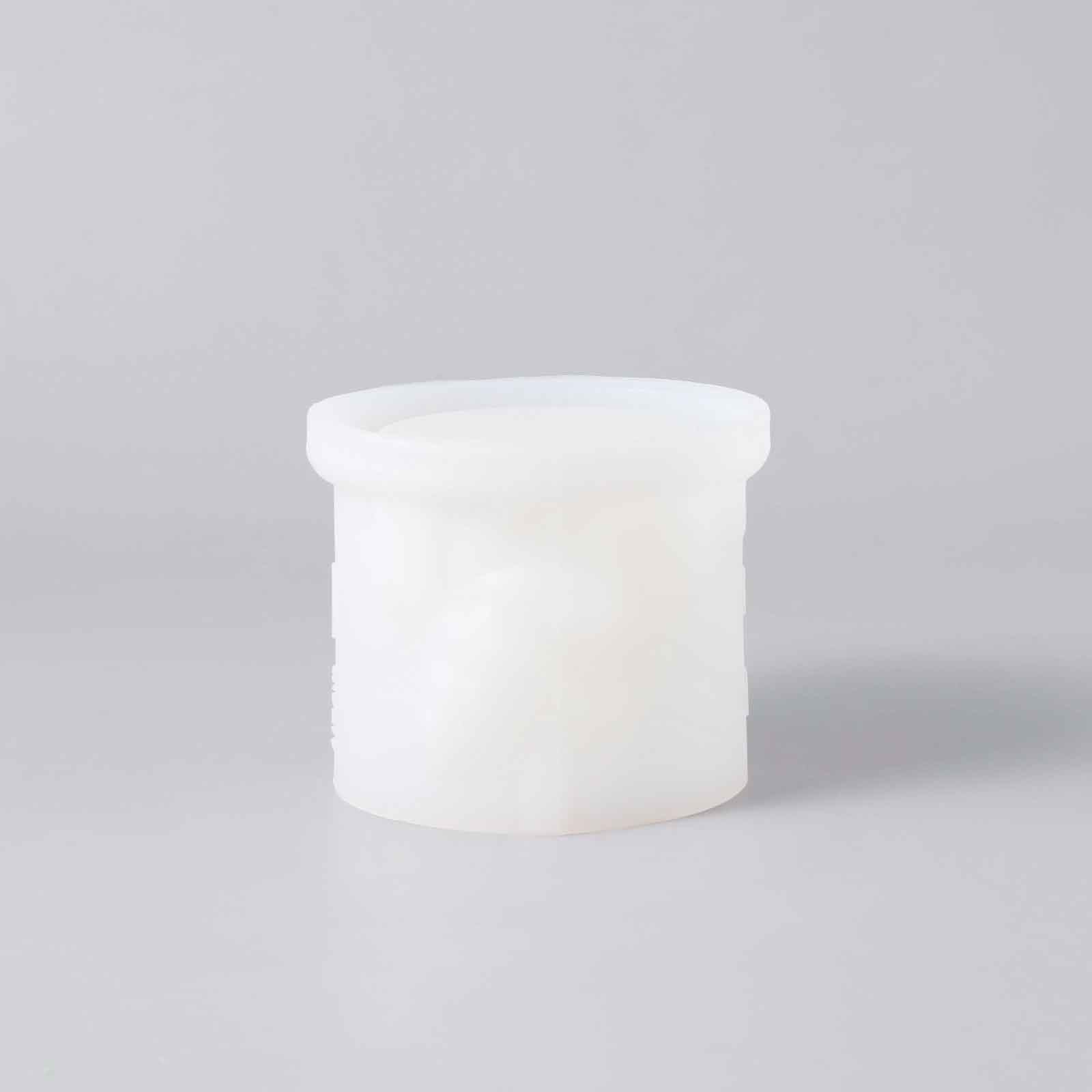 White silicone mold for making Santa candle holders, designed by Boowan Nicole.