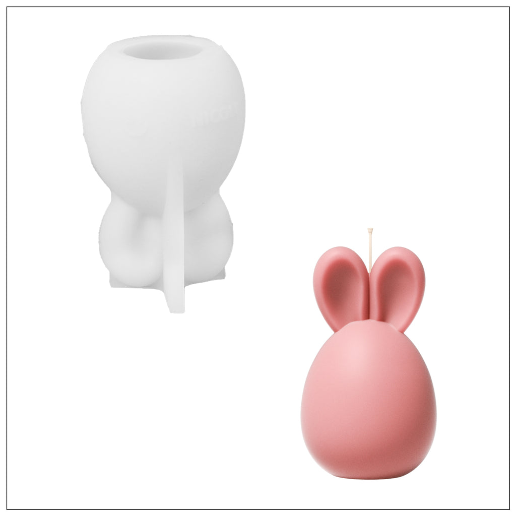 White silicone mold and finished Bunny Candles, essential tools for handmade crafts.