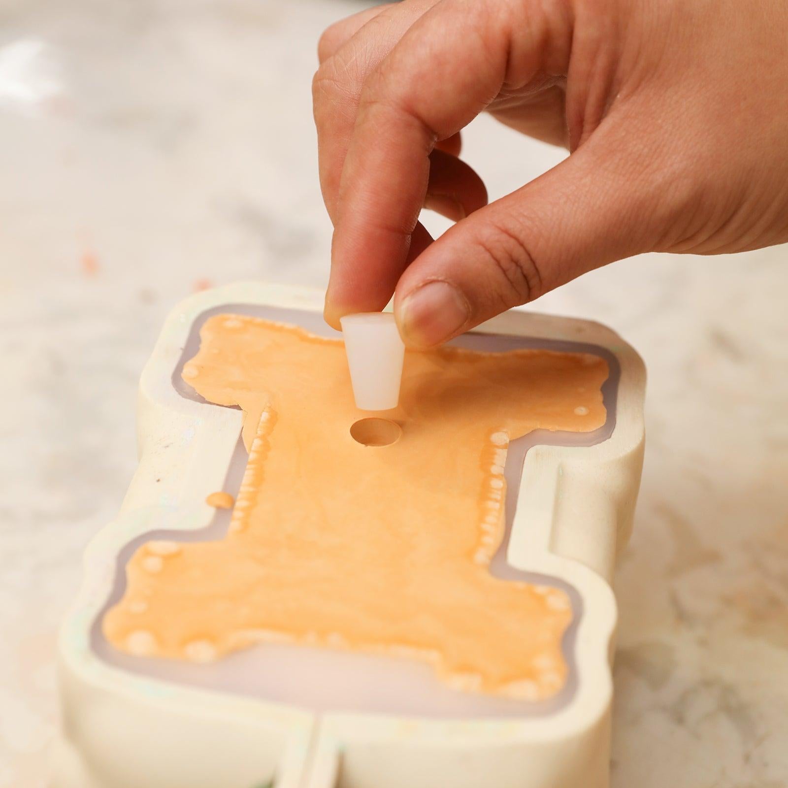 Put silicone plugs into the boowannite material used to make Vintage Off-Road Car Plant Pot Concrete to reserve drainage holes-Boowan Nicole