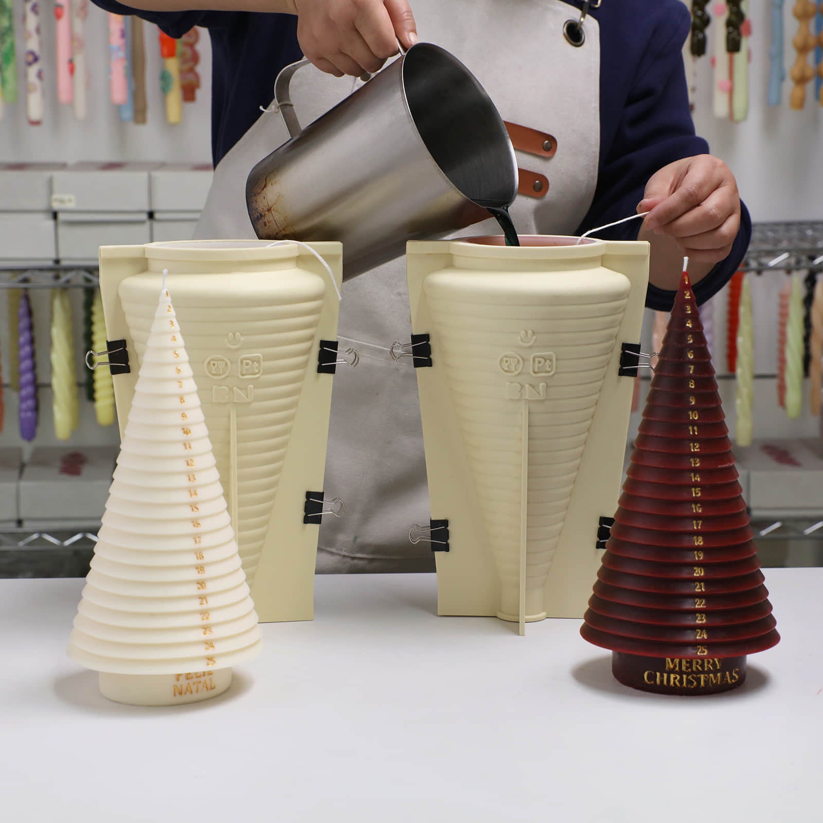 Pour the melted wax into the Advent Christmas tree candle silicone mold with support shells - Boowan Nicole