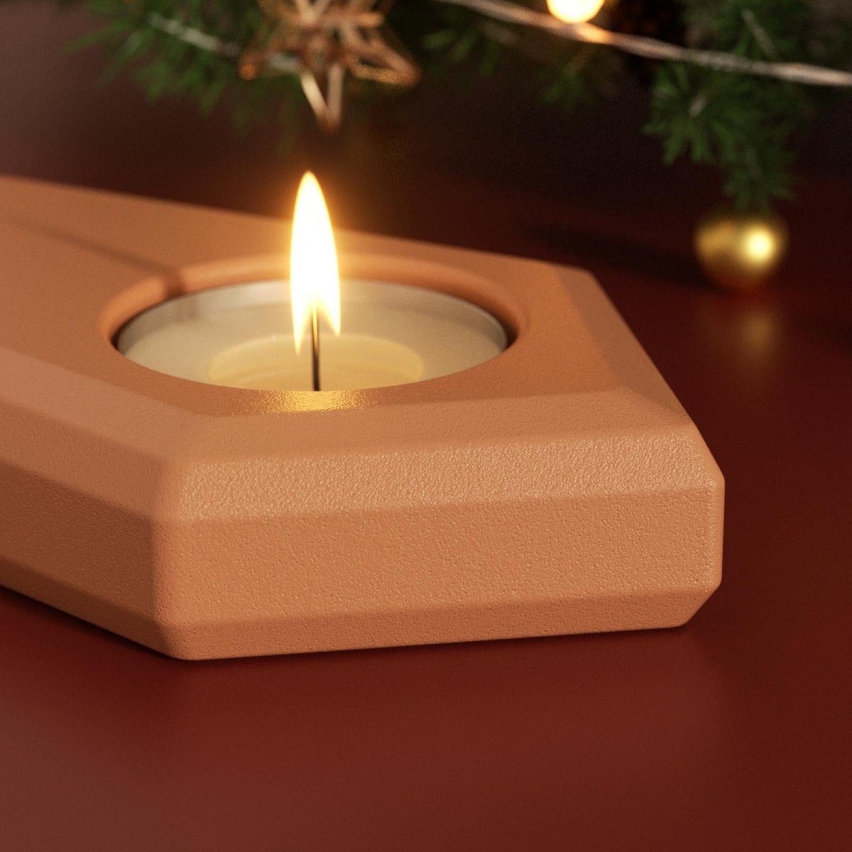 Close-up of lit tealight candle in modular Advent silicone holder, Christmas décor background - Boowan Nicole