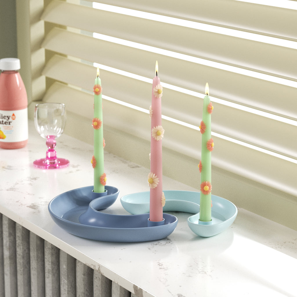 BLOSSOM daisy delight candle set with modern curved holders, daisy-adorned tall candles, perfect for elegant home decor or gifts