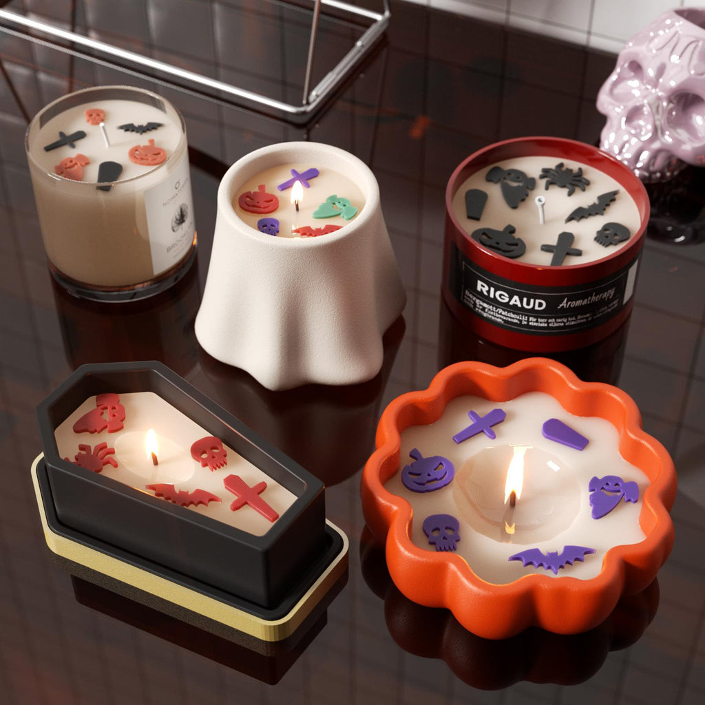 Halloween-themed candles in various shaped jars, decorated with spooky wax embeds like skulls, pumpkins, and bats - Boowan Nicole