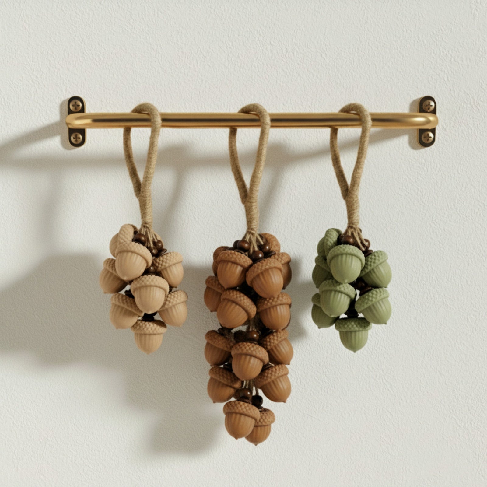 Bubbly Acorn Bunch cluster soaps—three rope-hung bundles in tan and sage on a brass bar - Boowan Nicole