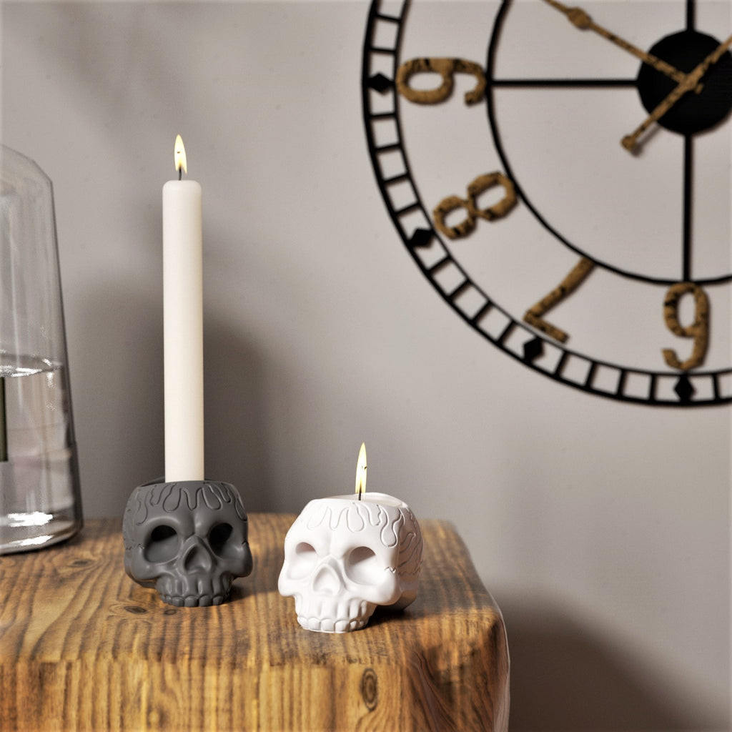 A candle holder that can be used for both taper candles and tealights.