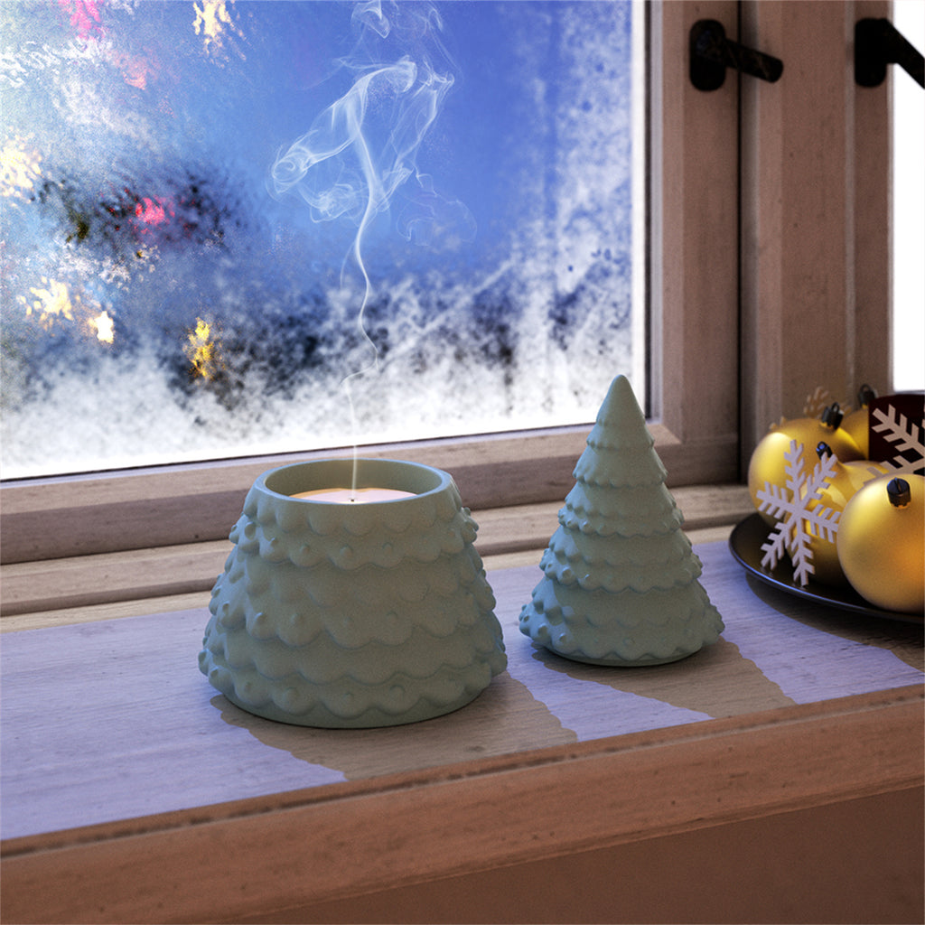 A blue candle jar lit on the windowsill, adding a warm and cozy winter atmosphere-Boowan Nicole