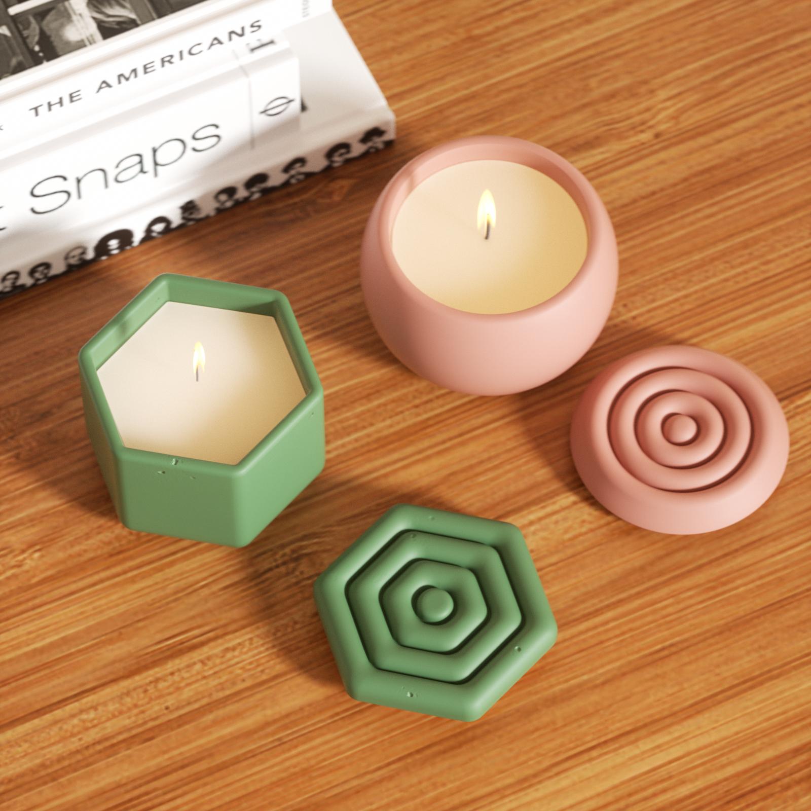 Polygonal candle jars and oval candle jars with lit candles on the tabletop add some warm atmosphere to the home.