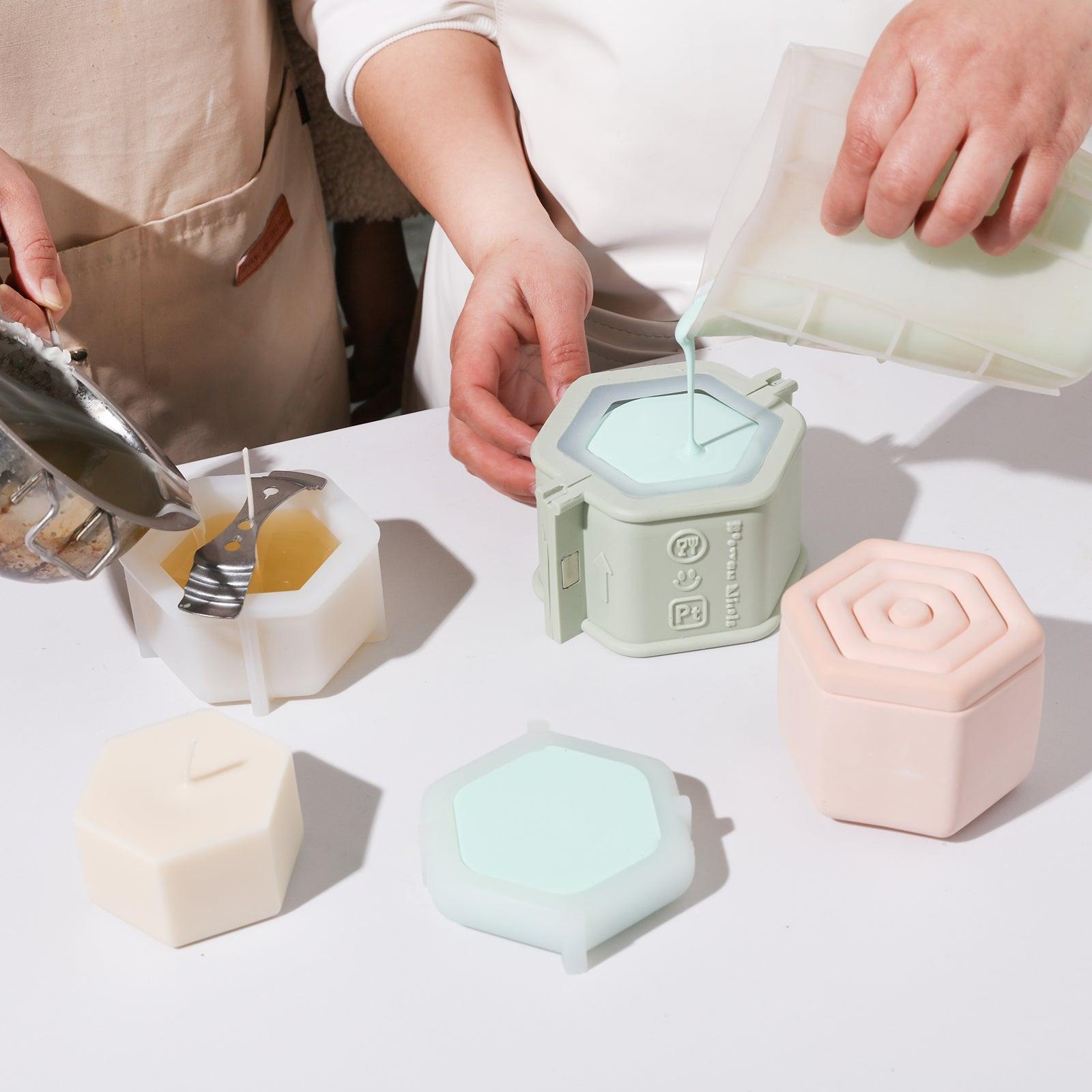 Use silicone molds to create hexagonal candle jars and candle refills.