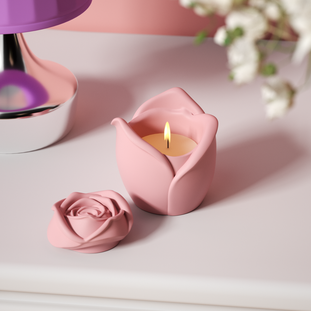The candle in the pink Rose Reverie Candle Jar is burning slowly on the table - Boowan Nicole