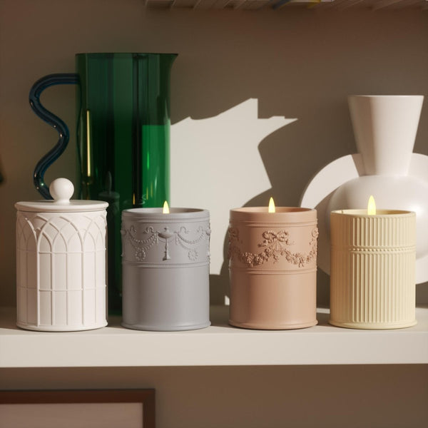 Four different shapes of concrete candle jars to light and use for more ambiance-Boowan Nicol
