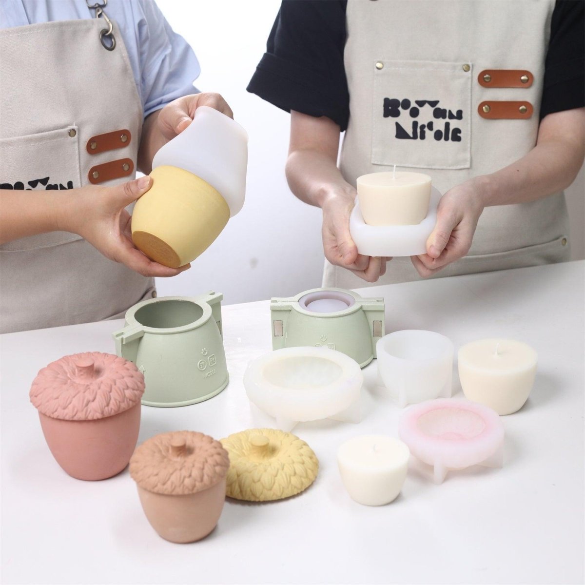 Demolding  acorn-shaped candle jars and candle refill molds using Boowan Nicole's silicone molds