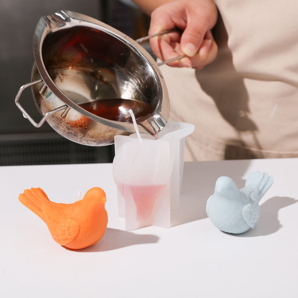 Pour the orange liquid wax into the silicone mold, designed by Boowan Nicole.