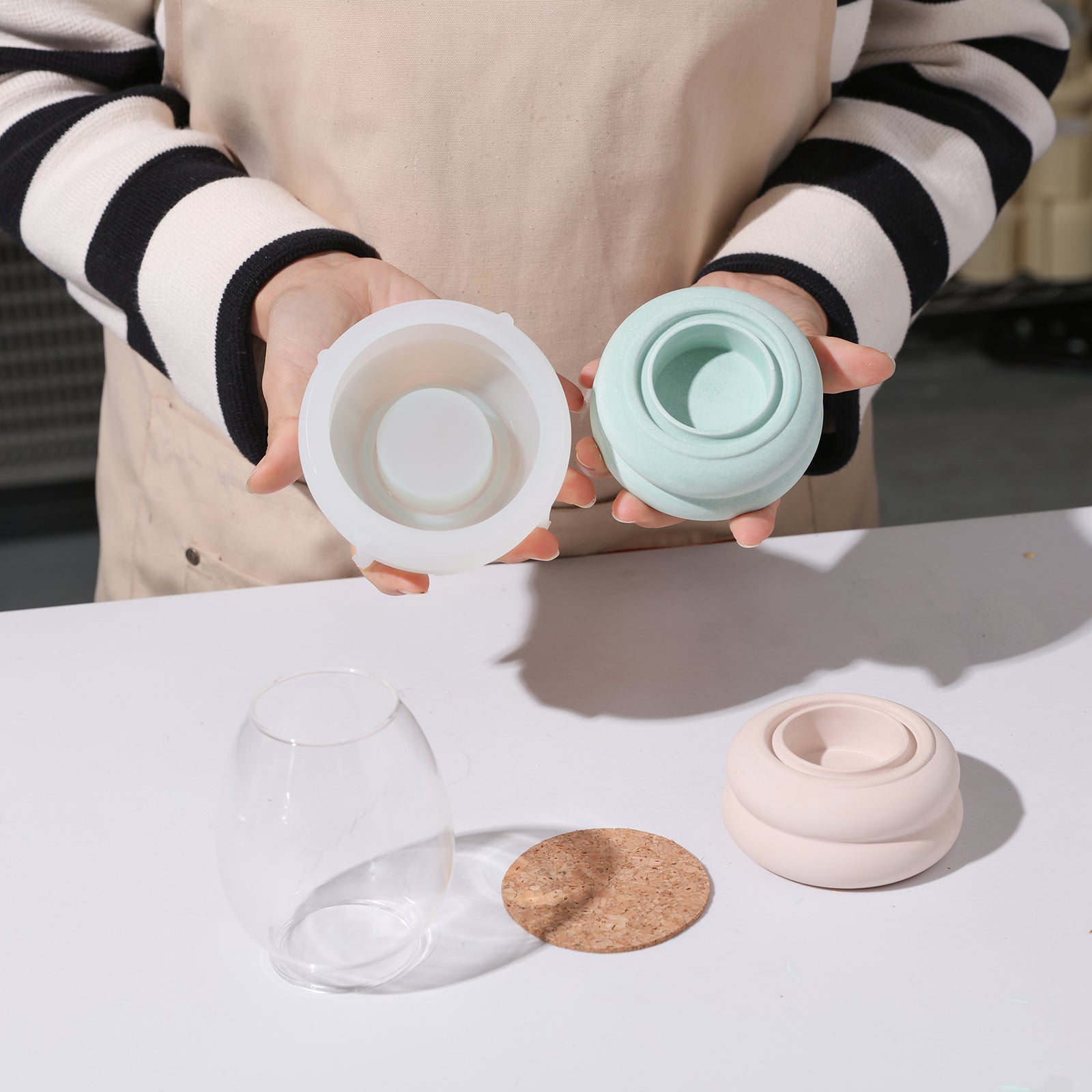 Gently showcasing the meticulously crafted candle holder in hands