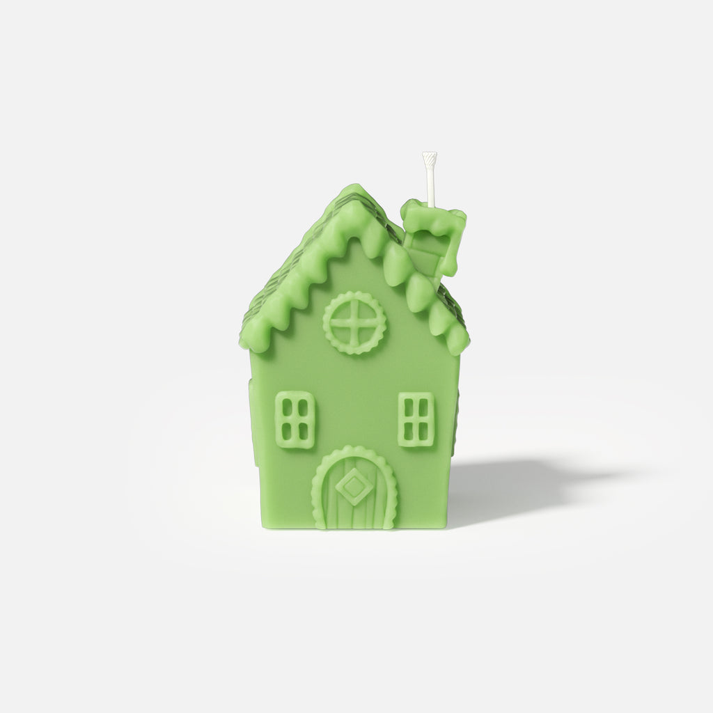 Single chimney house candle made using silicone molds.