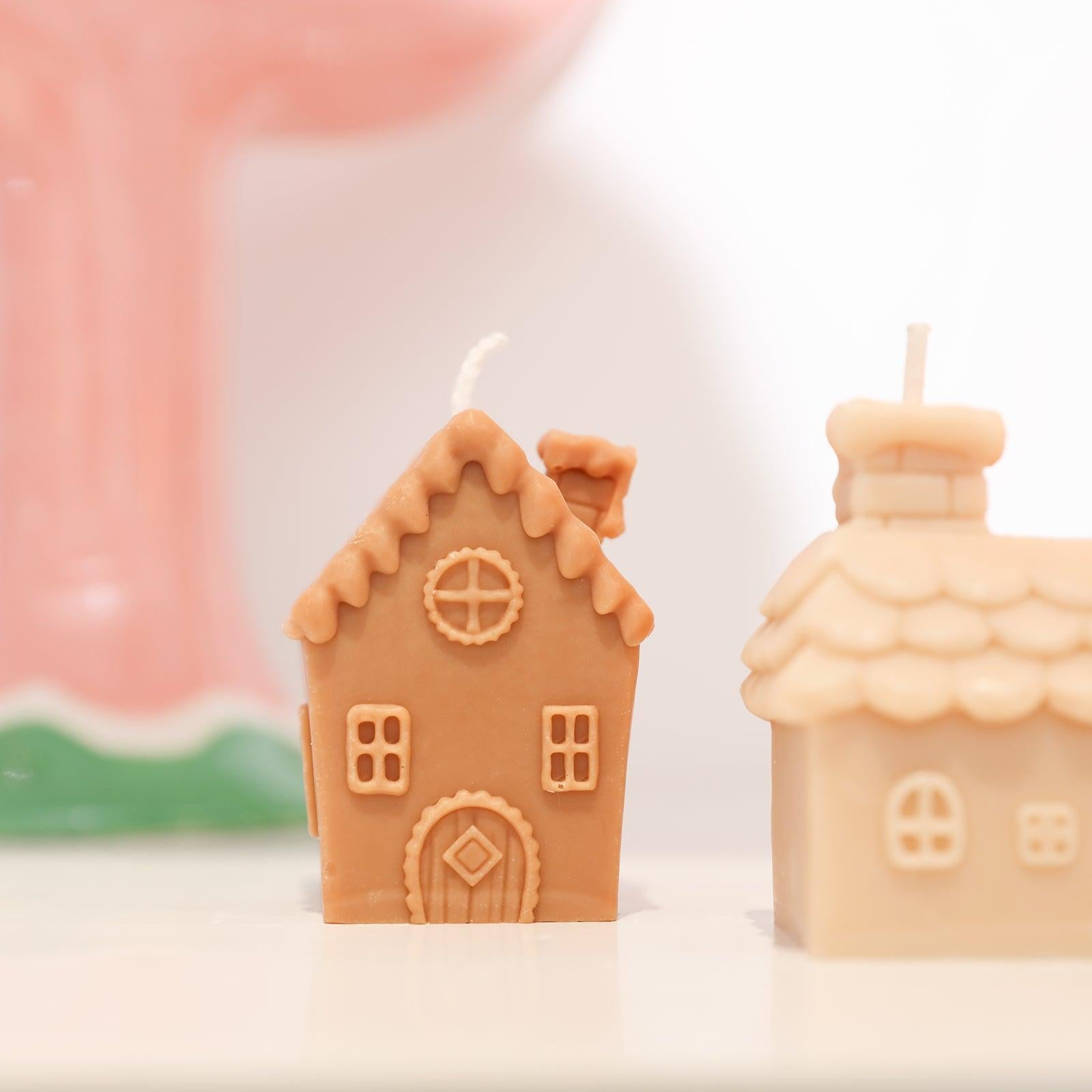 The single chimney house candle placed on the table, taken in close range, makes the candle look particularly cute at this moment.