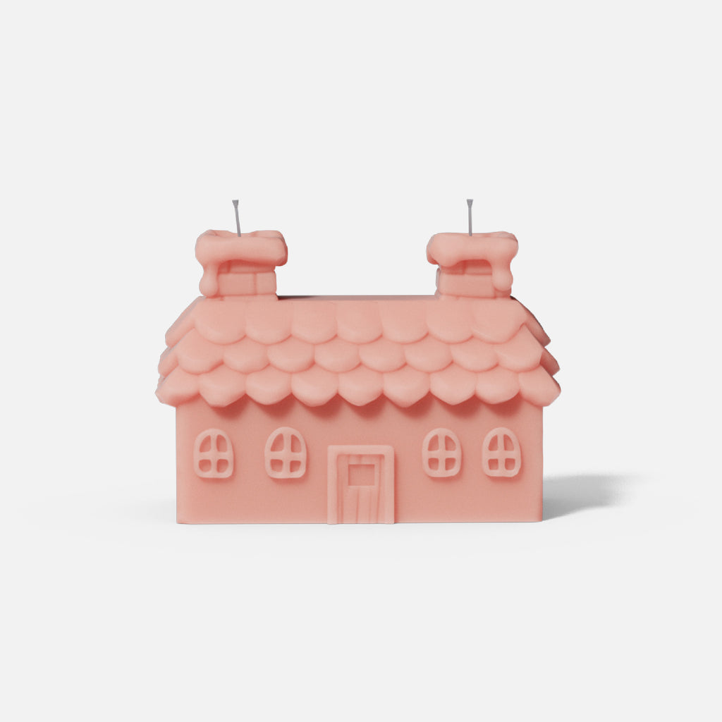 Double chimney house candle made using silicone molds.
