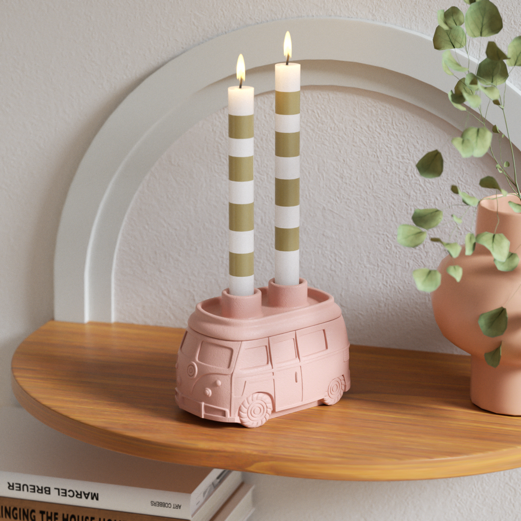 Pink car-shaped candle holder paired with colorful candles, ideal as a decorative piece for modern home spaces-Boowan Nicole