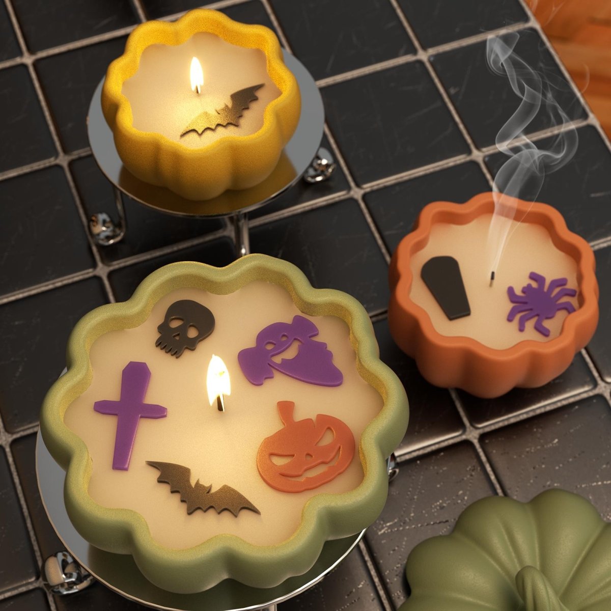 Halloween candles in pumpkin jars with spooky shape embeds – burning and extinguished - Boowan Nicole