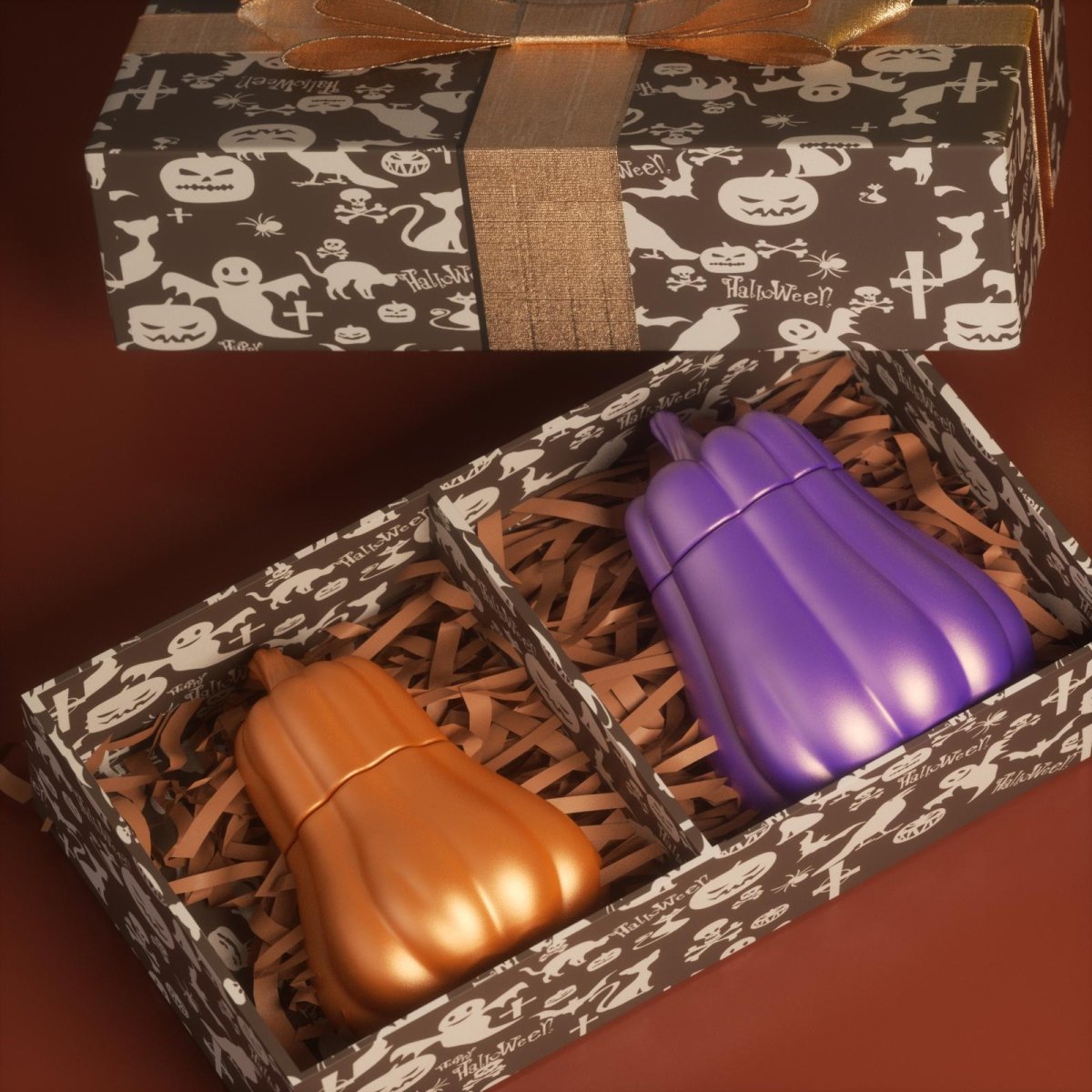 Halloween-themed gift box with metallic orange and purple pumpkin-shaped candle jars - Boowan Nicole
