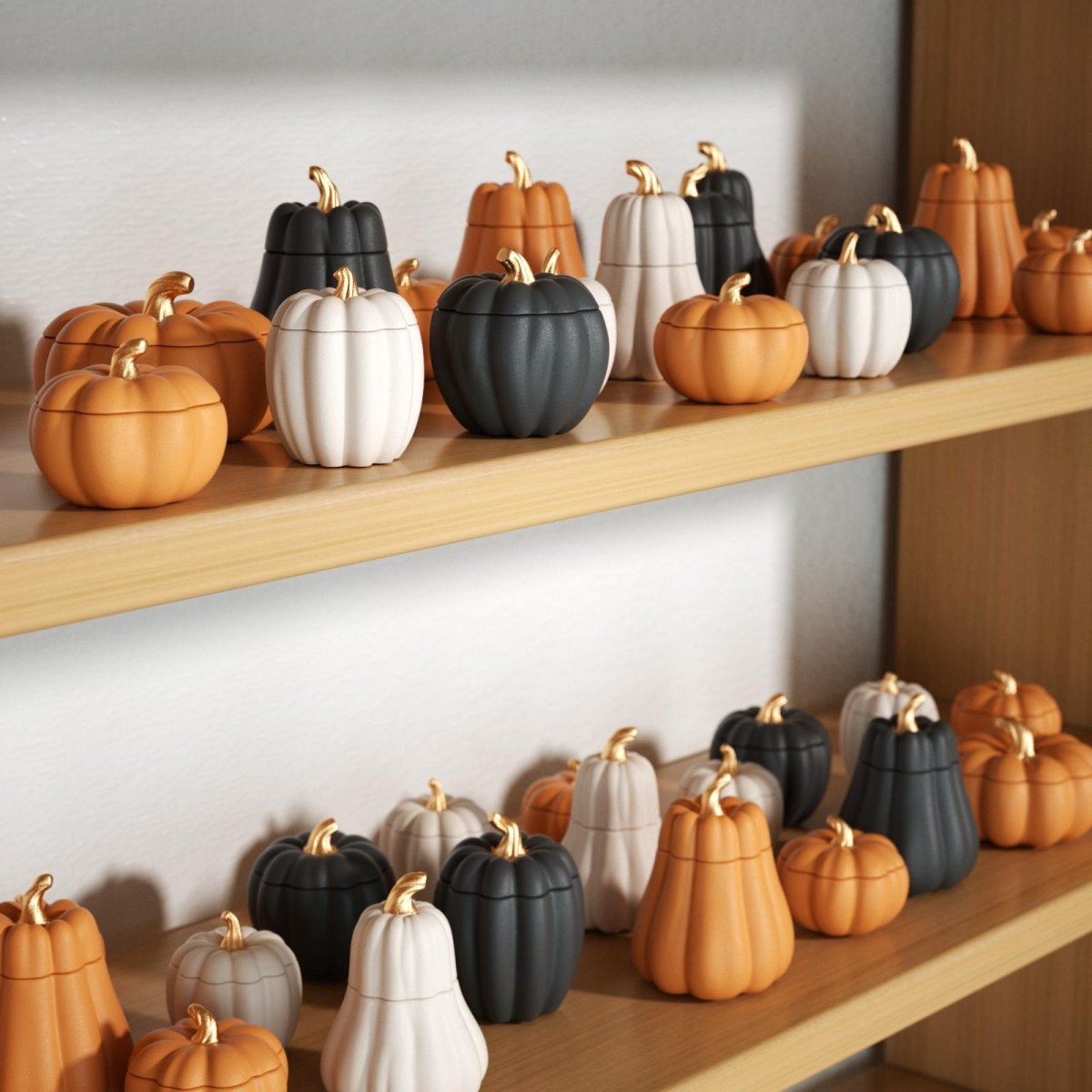 Shelf display of 8-style pumpkin candle jars made from silicone molds – ideal for seasonal bulk crafting and Halloween decoration - Boowan Nicole