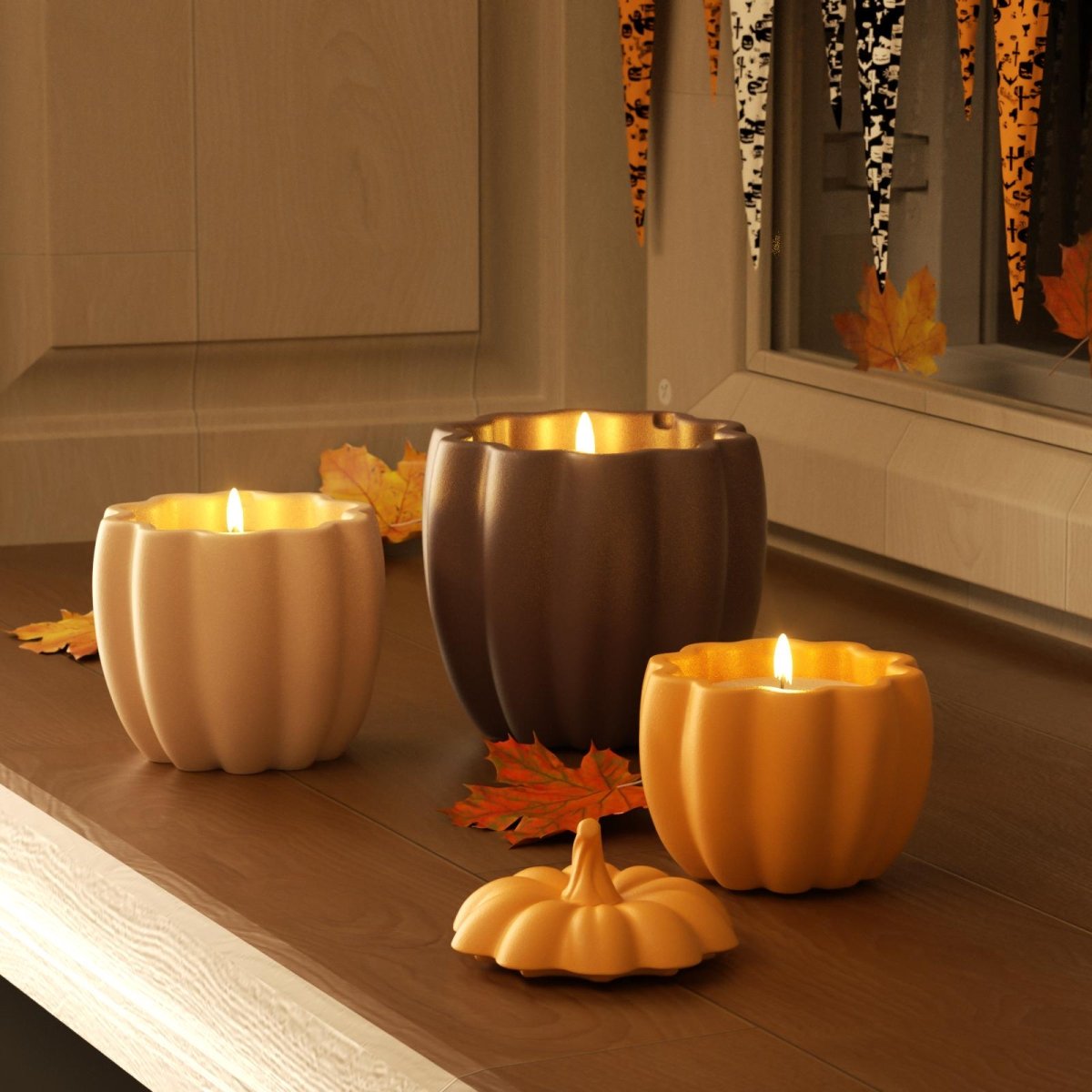 Burning pumpkin-shaped candles in cream, dark brown, and yellow jars – cozy Halloween or autumn decor with falling leaves - Boowan Nicole