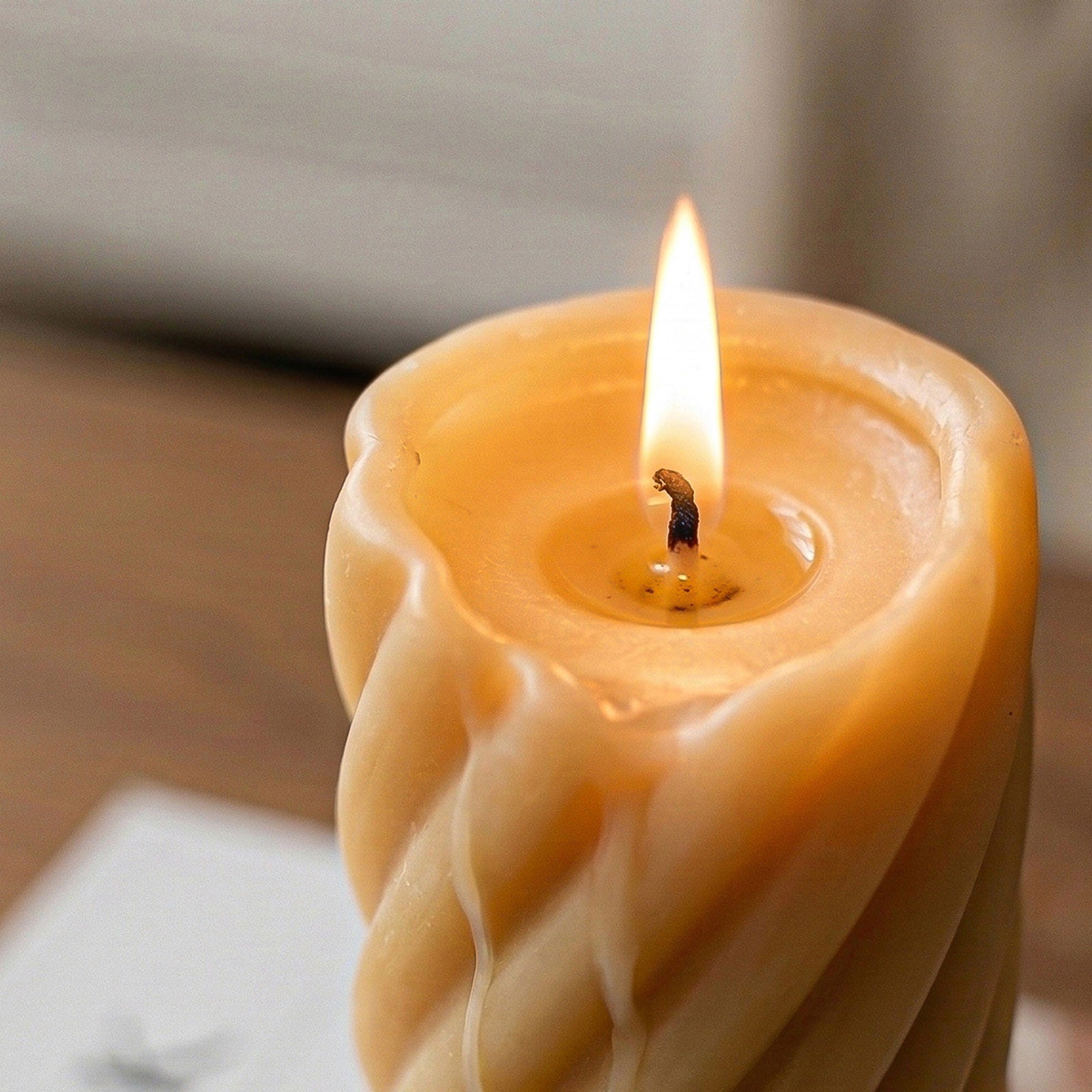 Set of two twisted spiral pillar candles in amber and light blue - Boowan Nicole