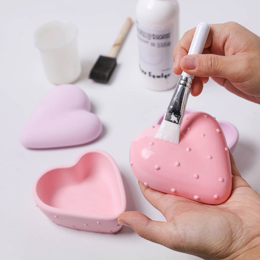 Applying Glossy Sealer inside the candle jar to add shine and prevent wax seepage - Boowan Nicole