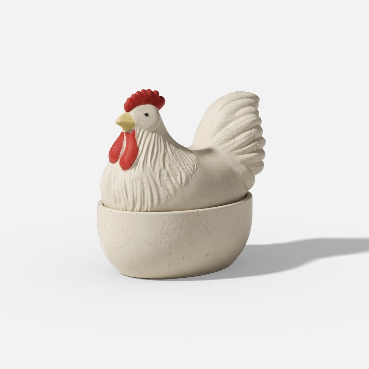 White hen-shaped candle jar with a red comb and textured feathers, featuring a two-part lid and bowl base design - Boowan Nicole