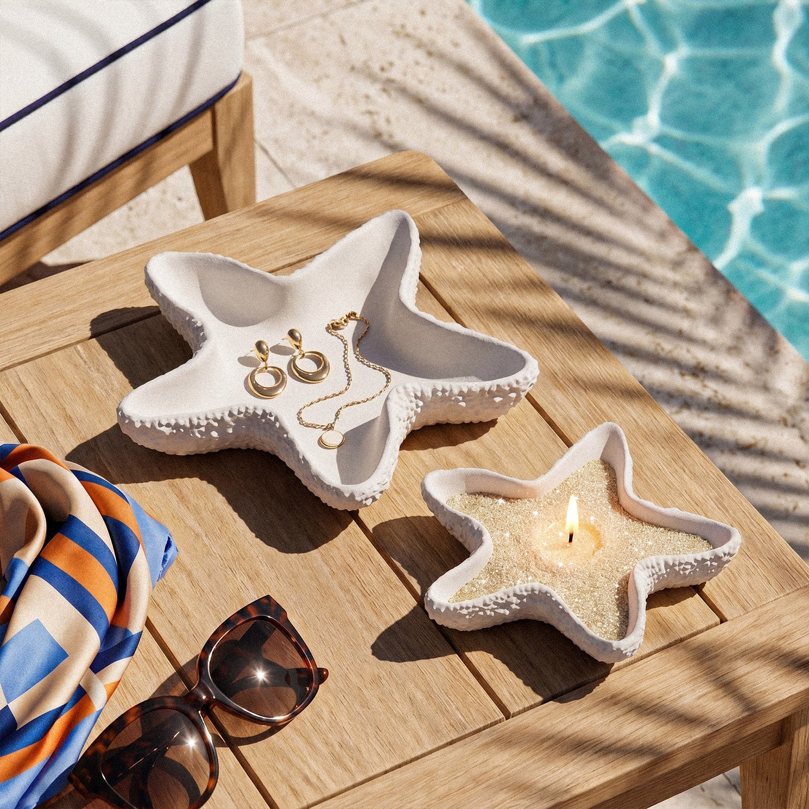 Lit Textured Sand Wax Starfish Candle Rested on Beach Sand with Natural Seashell Decor - Boowan Nicole