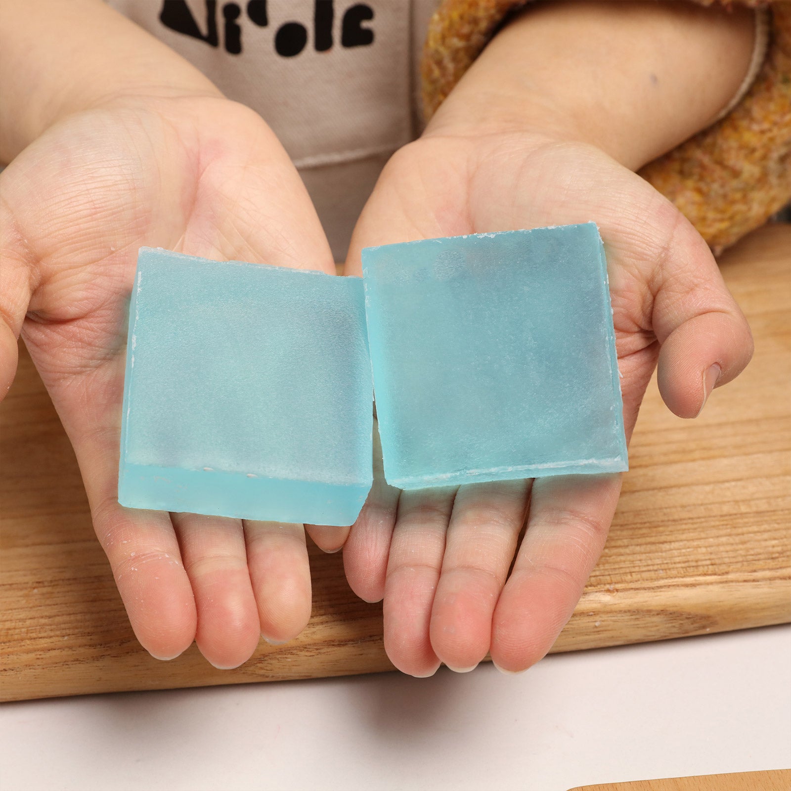 Finished Blue Cologne Soap Bars in Hands - Boowan Nicole