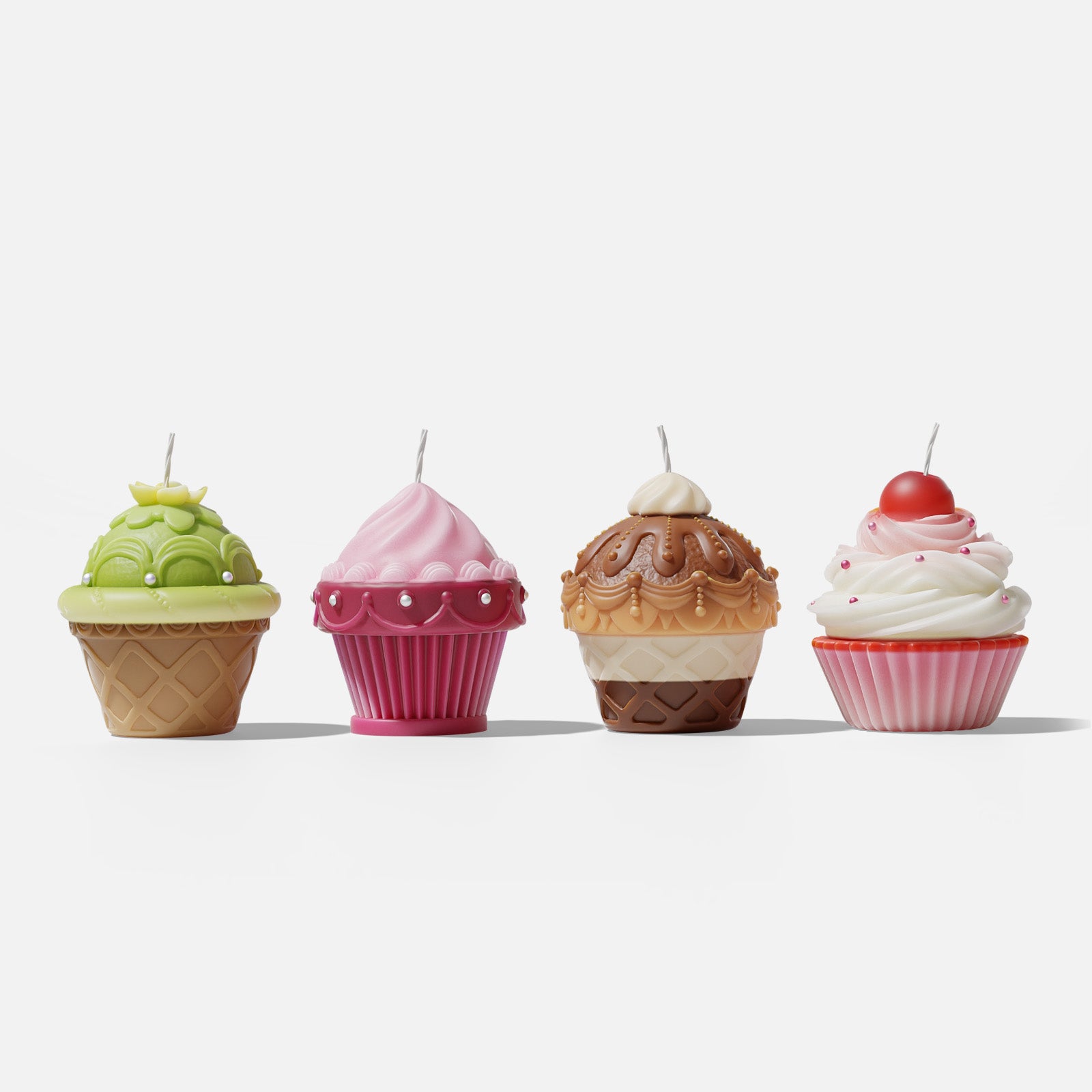 Assorted cupcake and ice cream cone shaped candles in green, pink, chocolate, and vanilla styles, unlit on white background - Boowan Nicole