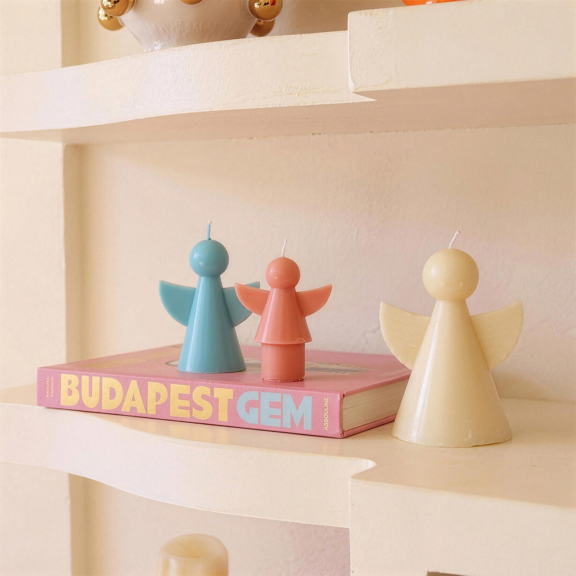 Angel Candles on Bookshelf - Boowan Nicole
