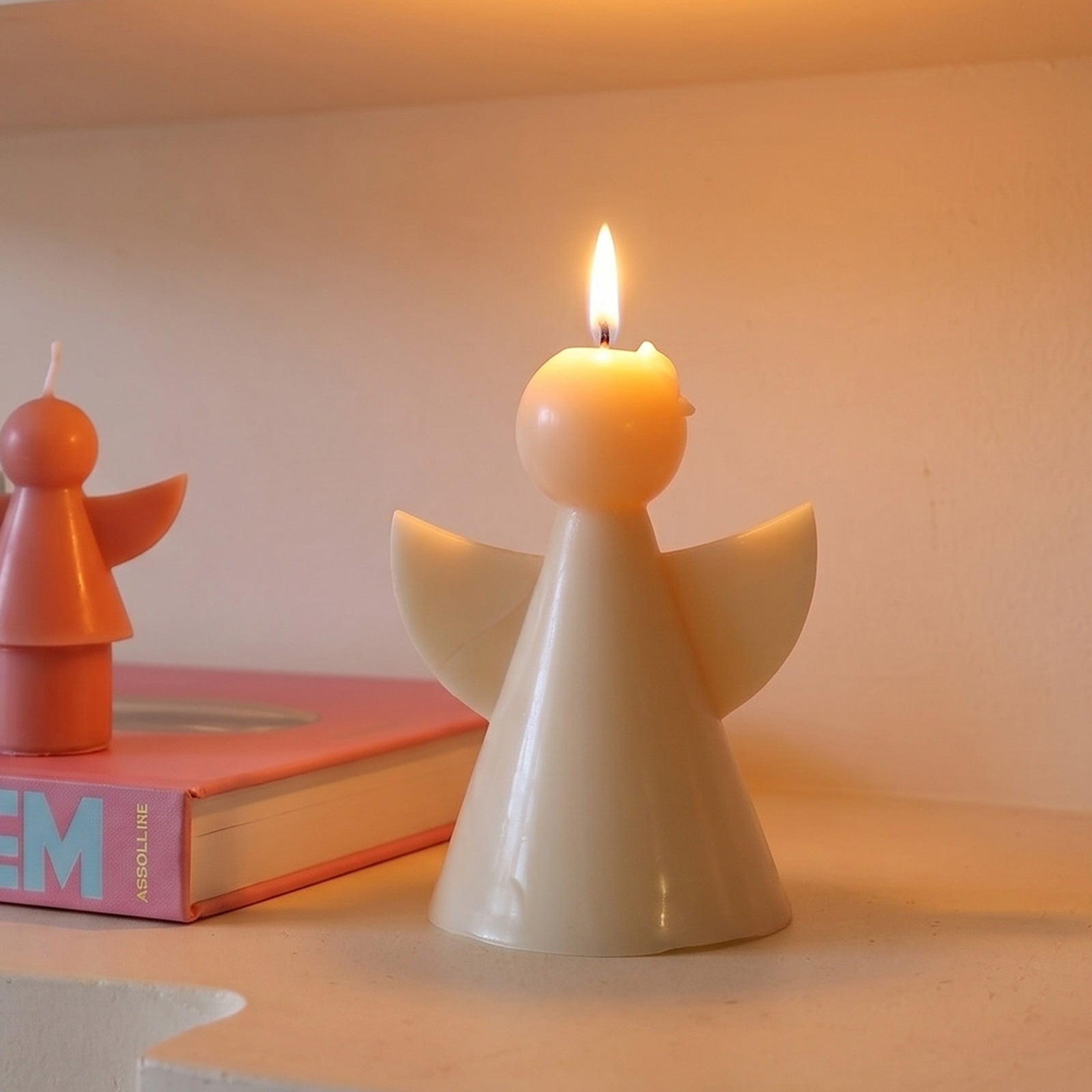 Lit Cream Angel Candle Close-up - Boowan Nicole