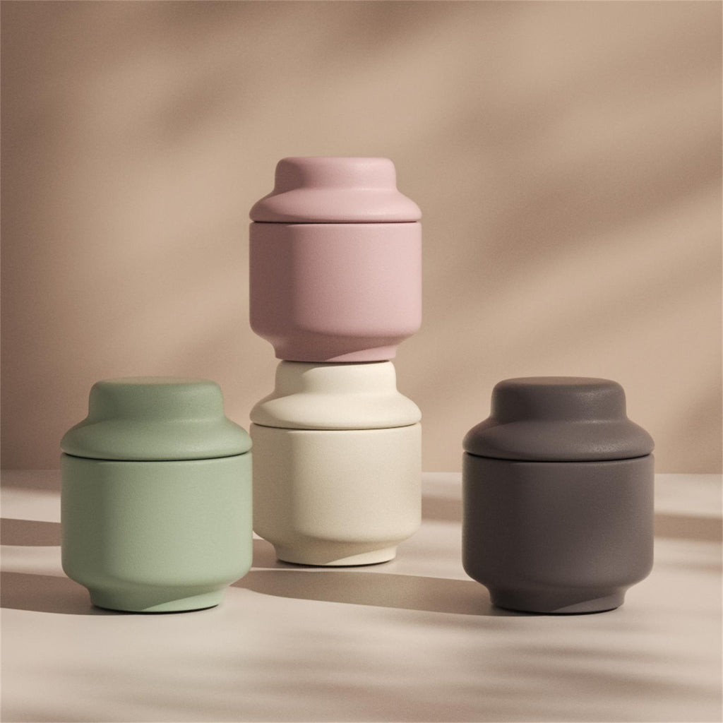 Set of minimalist candle jars in matte green, pink, cream, and charcoal – modern decorative storage and candle containers - Boowan Nicole