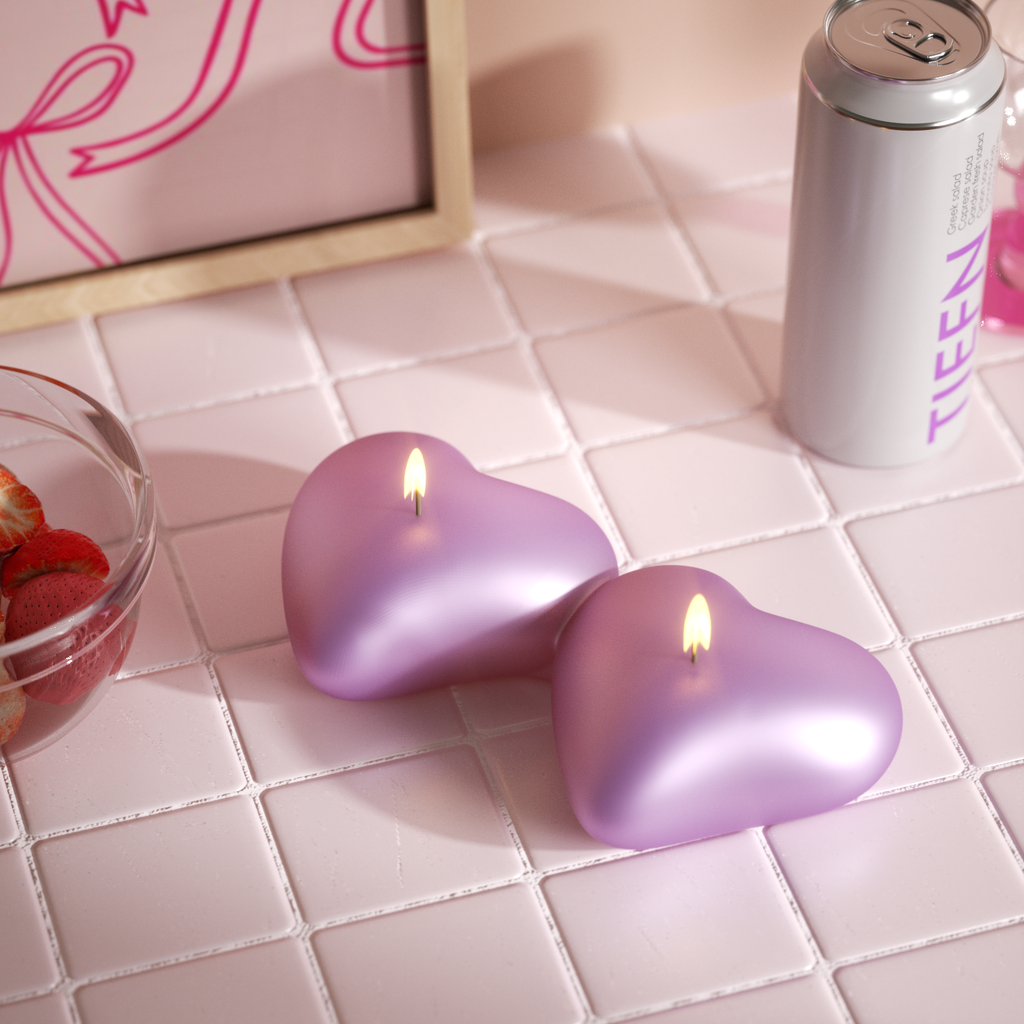 Handcrafted glossy purple heart-shaped candles, perfect for romantic decor or thoughtful gifts-Boowan Nicole