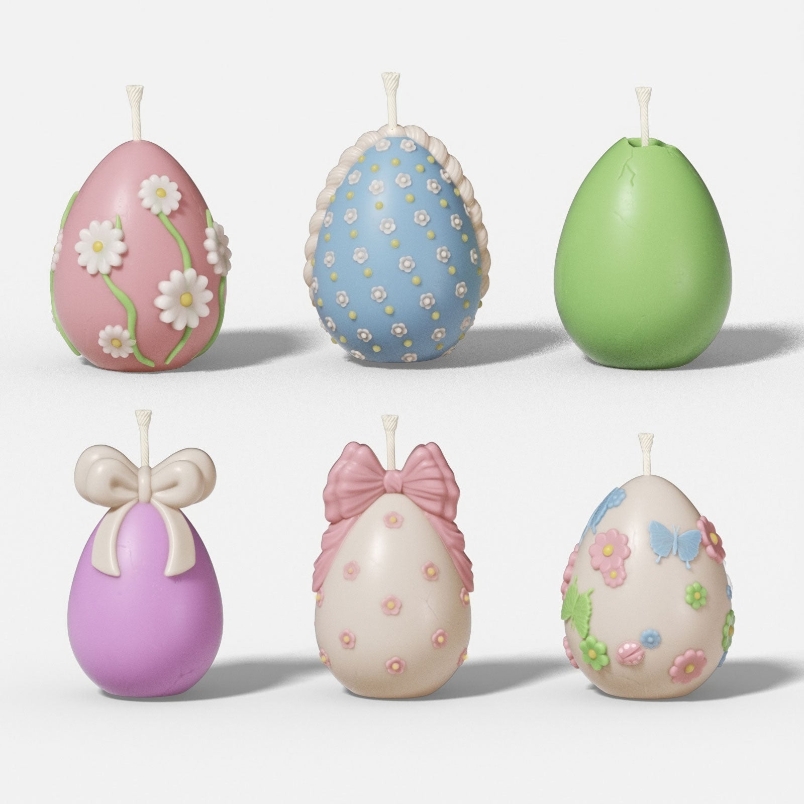Set of 6 pastel Easter egg candles with floral patterns, bows, and butterflies for spring decor - Boowan Nicole
