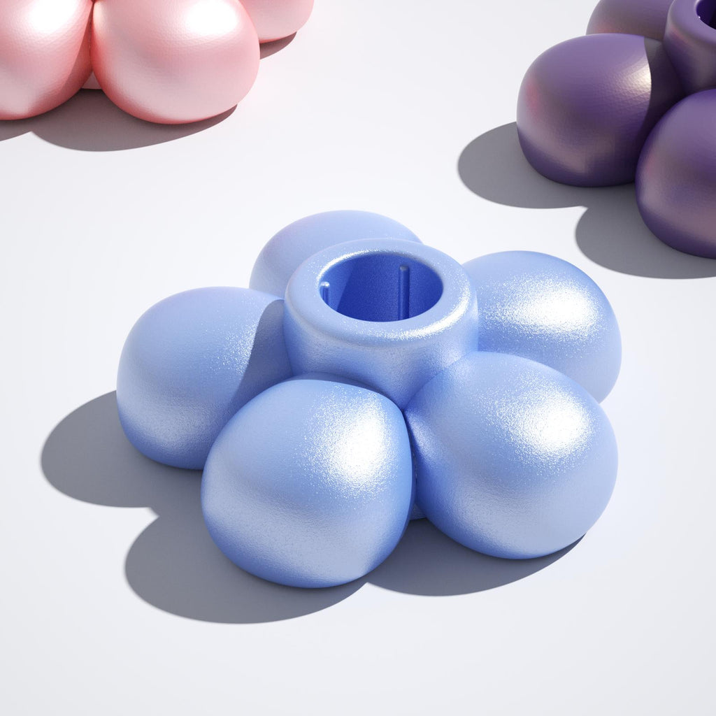Light blue flower-shaped candle holder base with a smooth, metallic finish-Boowan Nicole
