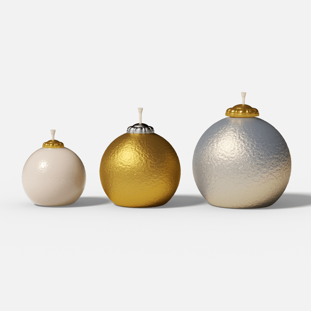 Set of three hammered-metal bauble candles (S/M/L)—ivory, gold, and champagne silver-to-gold gradient—with gold/silver caps on a white background - Boowan Nicole