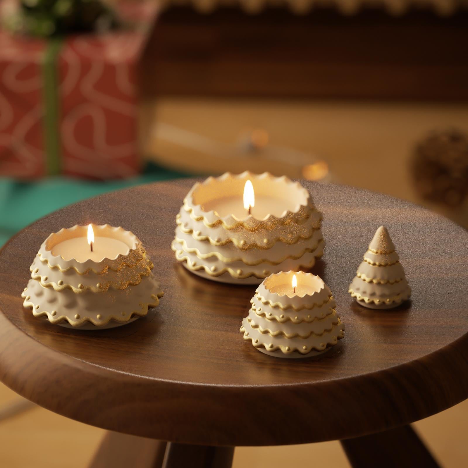 Stacked Christmas tree-shaped candles with golden mica accents, hand-poured and lit on a festive wooden table - Boowan Nicole