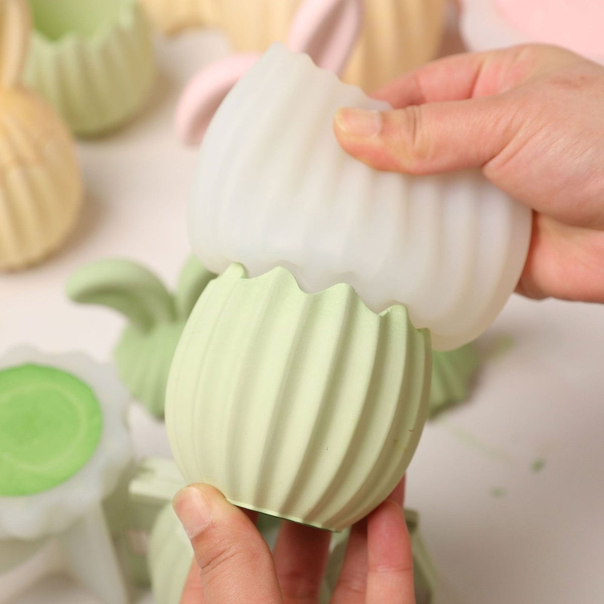 De-molding the silicone mold from a ribbed bunny egg storage jar - Boowan Nicole