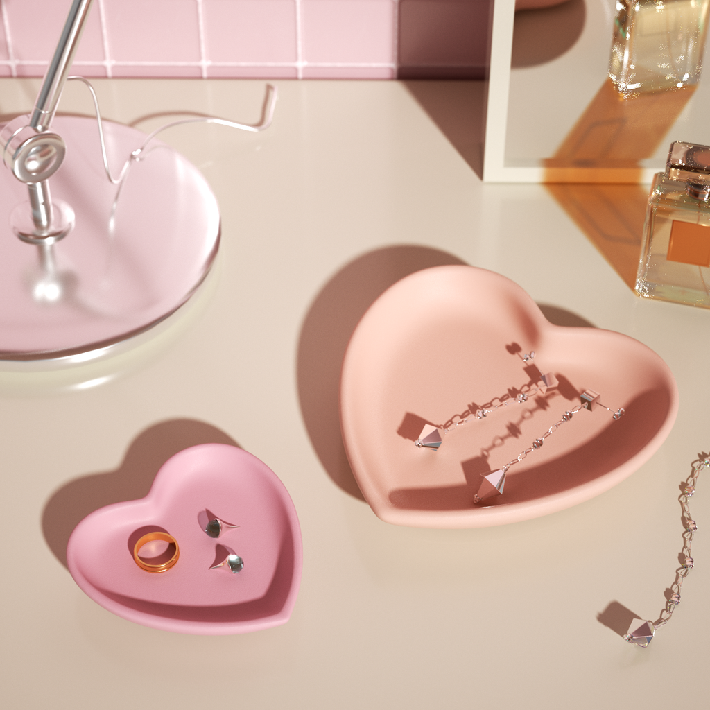 Chic heart-shaped trays in soft pink tones, perfect for displaying jewelry and adding charm to your vanity-Boowan Nicole