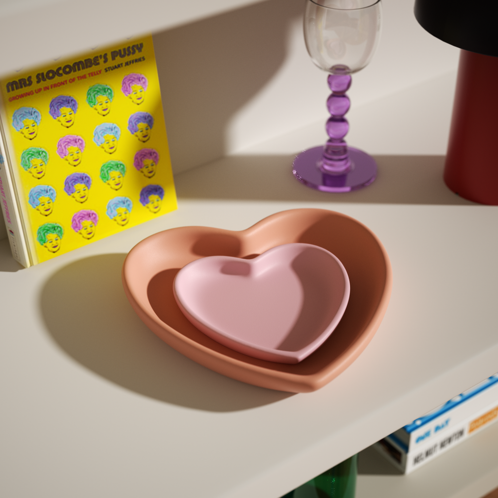 Handcrafted heart-shaped trays with warm tones are the perfect choice for stylish home decor and versatile storage-Boowan Nicole