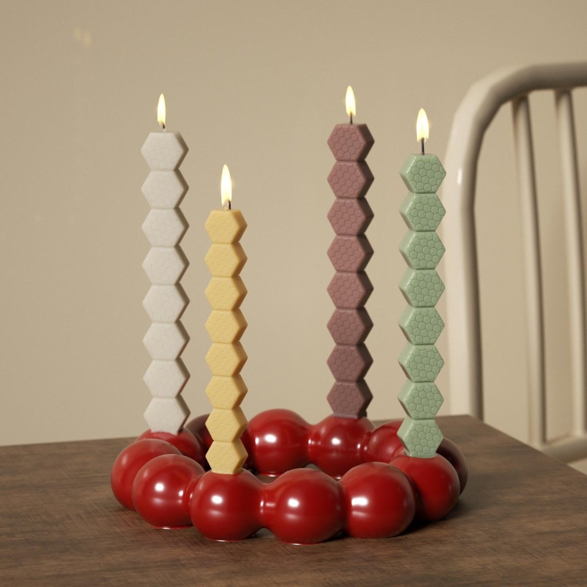 Colorful honeycomb beeswax candles in a red bubble holder, ideal for handmade decor or festive gifts-Boowan Nicole