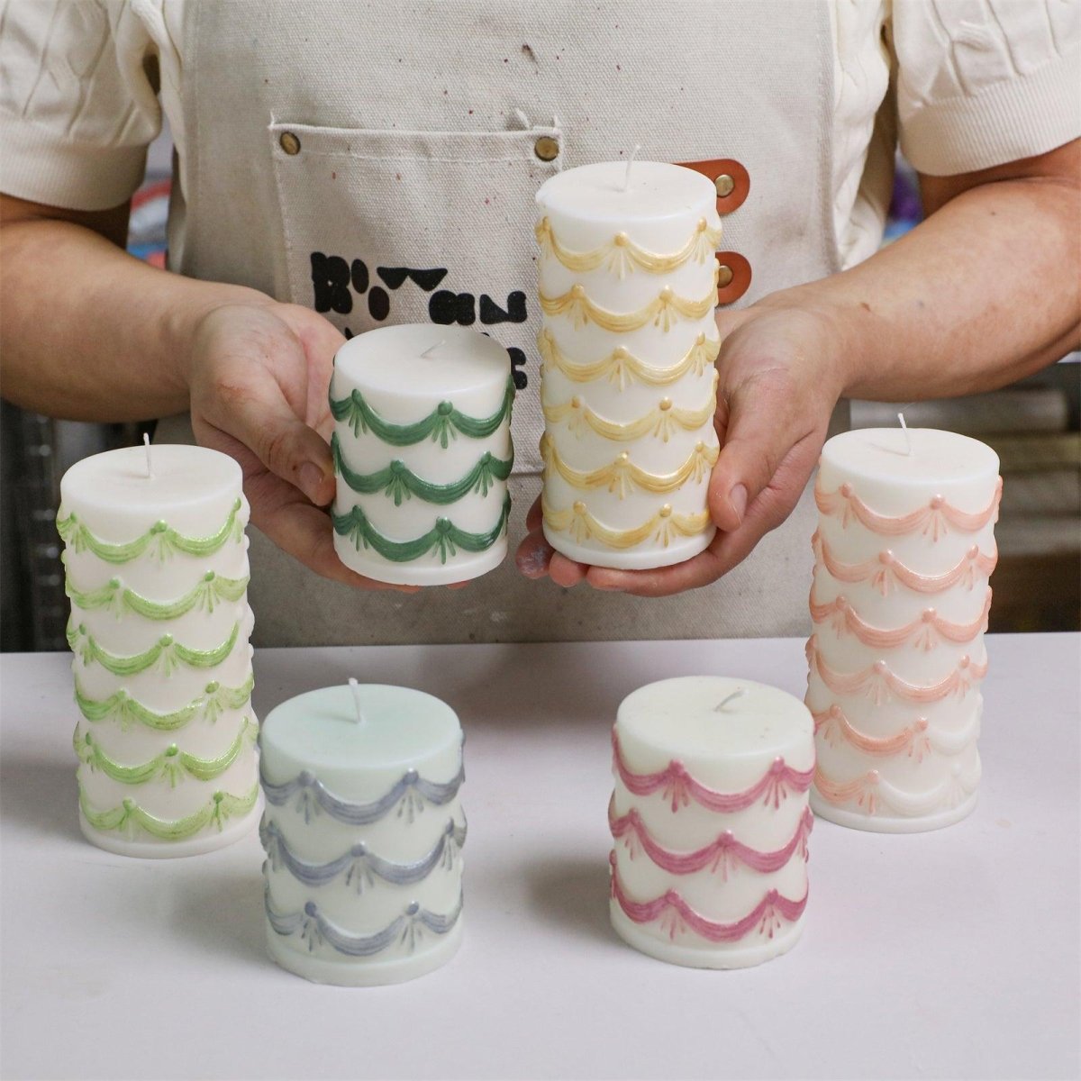 Hand-painted glossy candle varnish in 6 colors shown on finished candles - Boowan Nicole