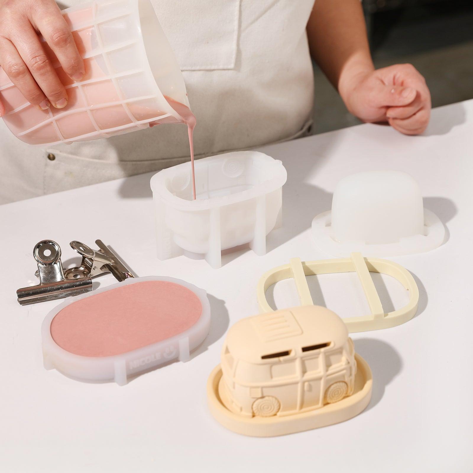 Demonstrating the process of making a vintage camper van incense burner from a silicone mold.