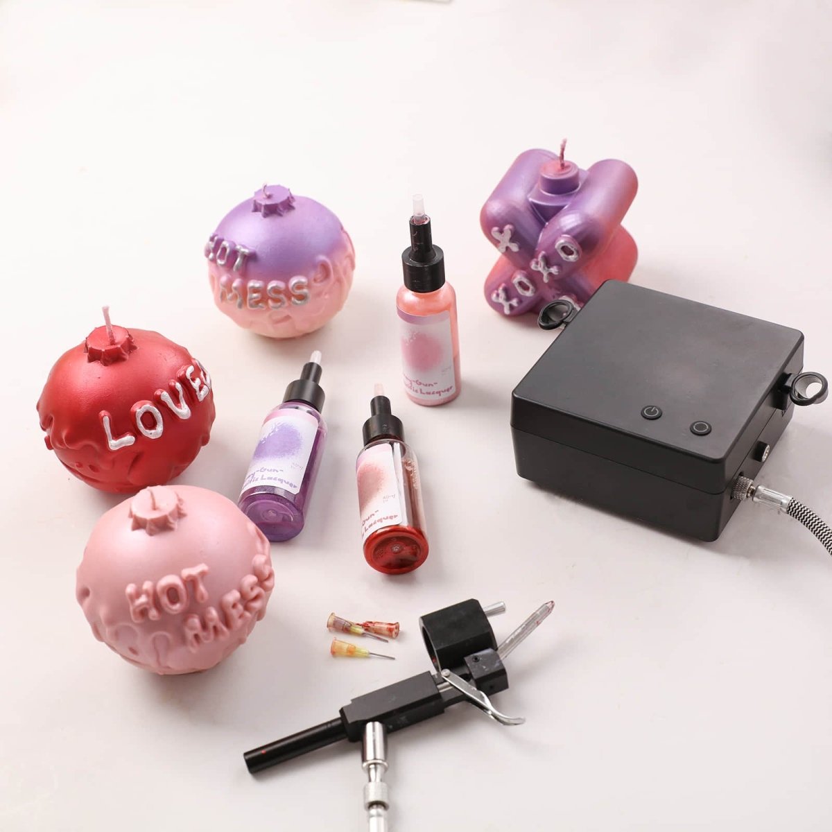 Coloring Large Boomy Love candles with the No-Clean Spray Gun using our Valentine’s Day Palette (Cherry Kiss, Blush Petal, and Amethyst Dream) - Boowan Nicole